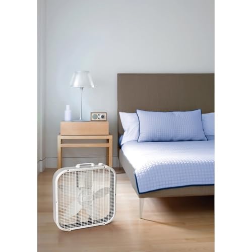 TrioBliss fan placed in a window for ventilation