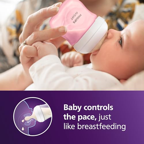 Four pink Philips Avent 4 oz baby bottles