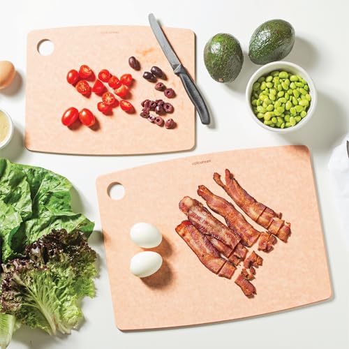 Epicurean board being cleaned in a sink