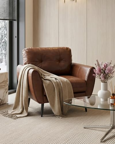 Close up of tufted stitching on faux leather chair