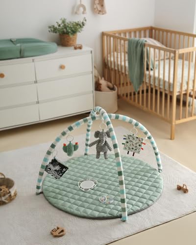 Modern minimalist nursery setup with play mat