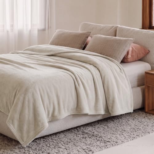 Bedsure fleece blanket spread on a King bed