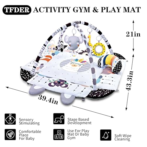 Infant playing with detachable toys on TFDER mat