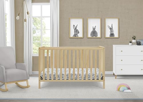Natural wood finish crib side view