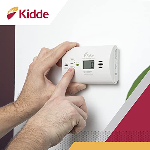 Portable Kidde carbon monoxide alarm on a table