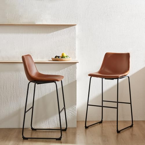 Side profile of warm brown faux leather stool