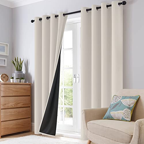 Folded cream curtains showing material quality