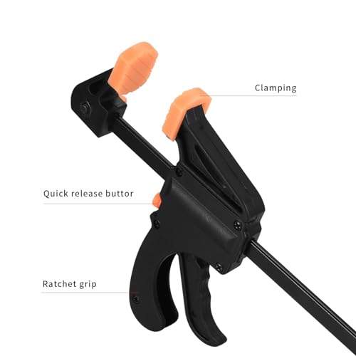 Soft jaw pads on black woodworking clamps