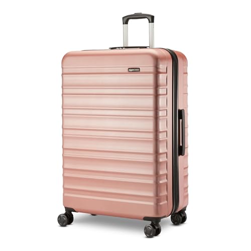 Front view of Basics 30-inch hardside luggage in rose gold