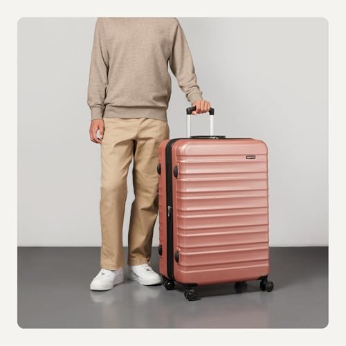Four multi-directional wheels on Basics hardside luggage