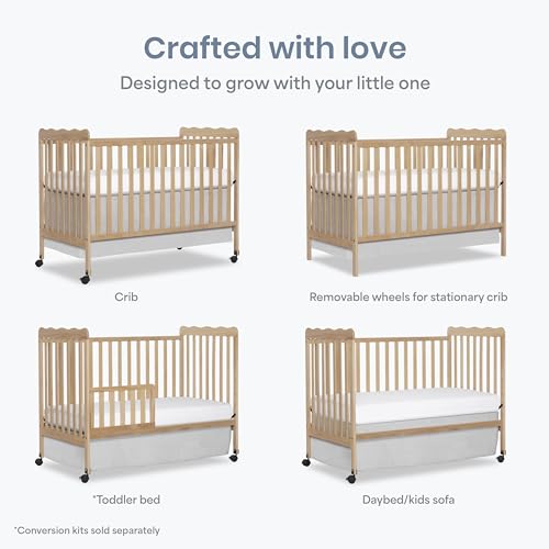 Dream On Me crib with caster wheels attached