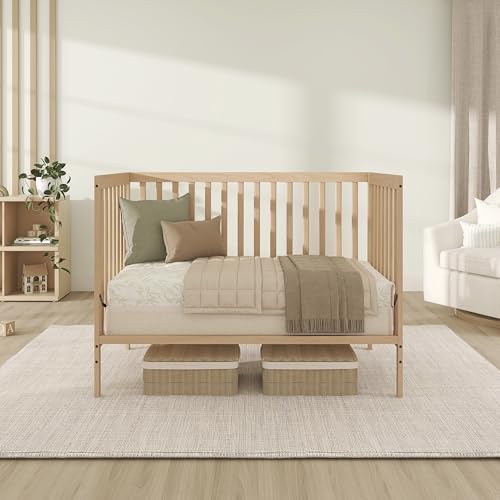 Full view of the Carson crib in a nursery setting