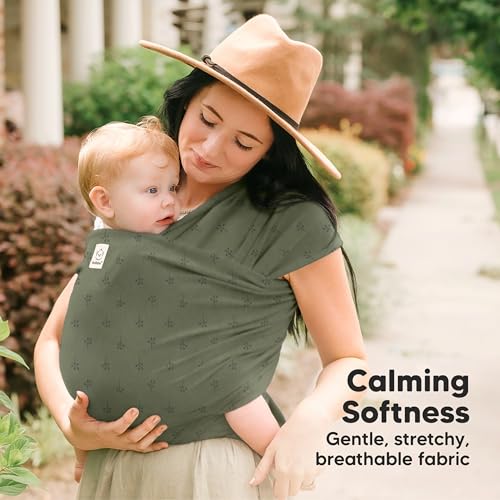 Parent wearing baby in KeaBabies wrap in Forest Berries