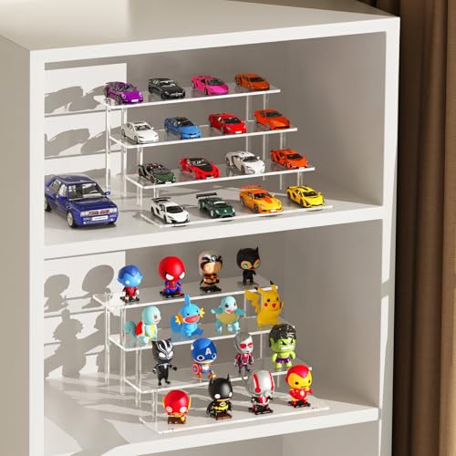 Transparent figure model display shelf on a desk
