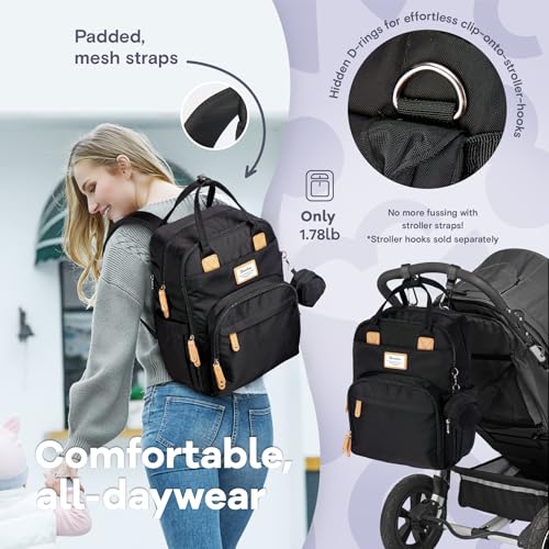Parent wearing RUVALINO diaper bag as a backpack