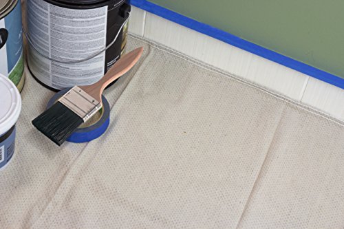 Worker using CoverGrip canvas on a job site
