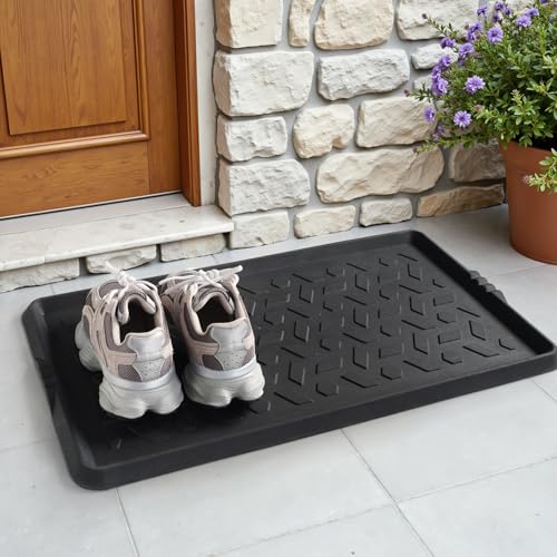 tchdio boot tray holding three pairs of shoes