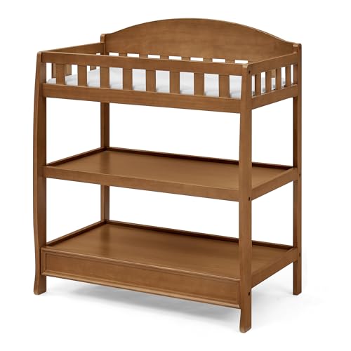 Safety strap on changing table surface