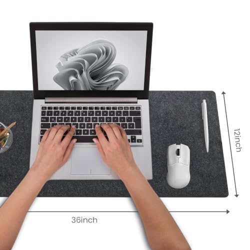Dark gray desk mat on office workspace
