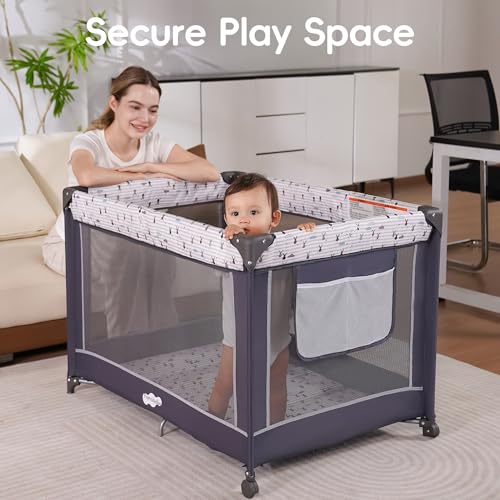 Grey portable baby travel cot