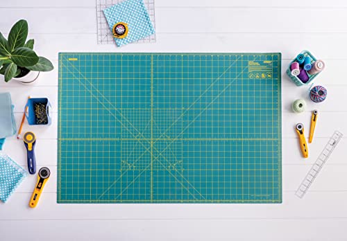 OLFA self-healing mat lying on a flat work surface