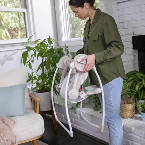 Side profile of Ingenuity Soothe 'n Delight baby swing