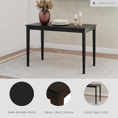 Signature Design by Ashley Kimonte table in a dining room