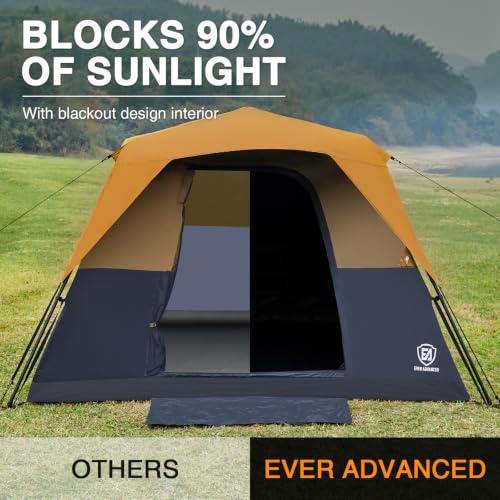 Orange blackout tent set up at a campsite