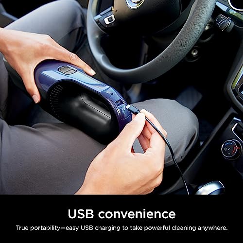 Shark vacuum with one-touch emptying feature