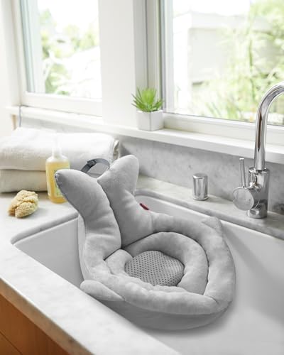 Skip Hop soft bath tub shown in a sink