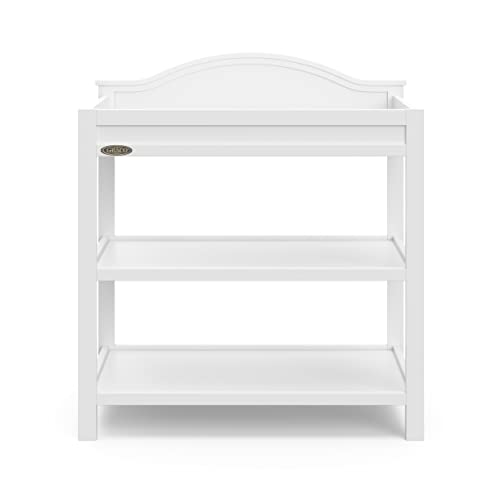Two storage shelves on Graco changing table