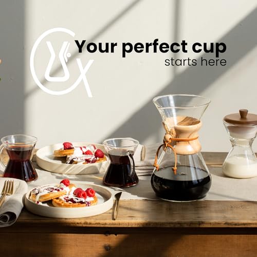 Chemex filters next to a glass coffeemaker