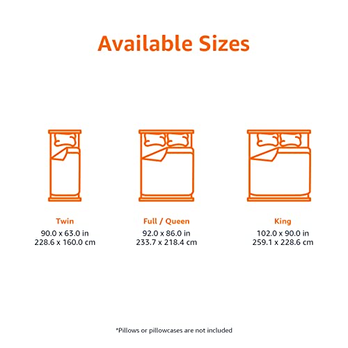 Comforter laid flat on a twin bed