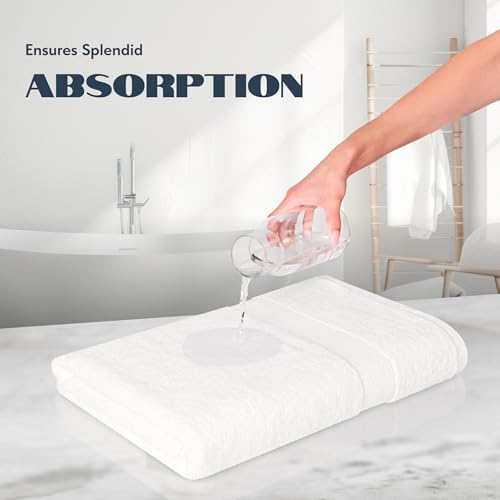 Stack of four White Classic bath towels