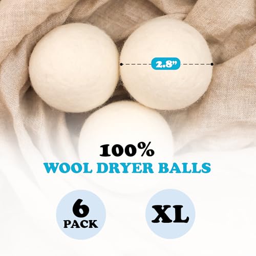 Six white wool dryer balls arranged together