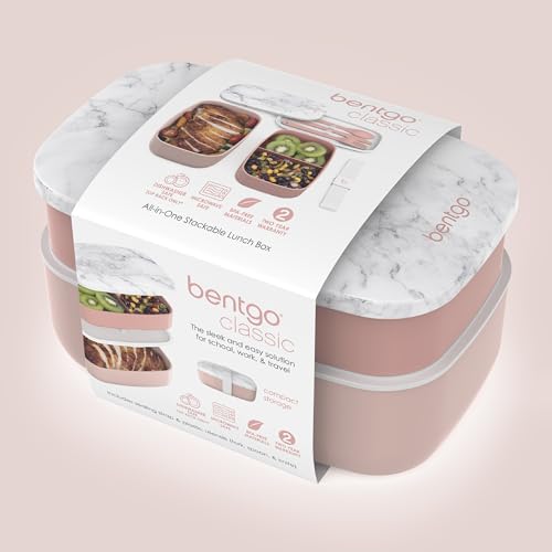 Three-compartment bento box packed with food