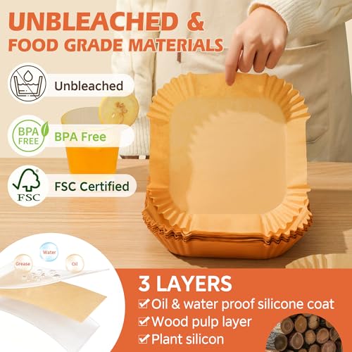 Stack of yellow disposable air fryer liners