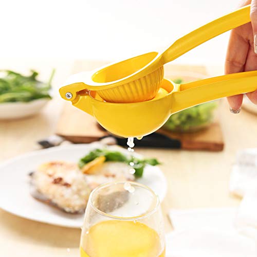 Y-me yellow metal fruit juicer