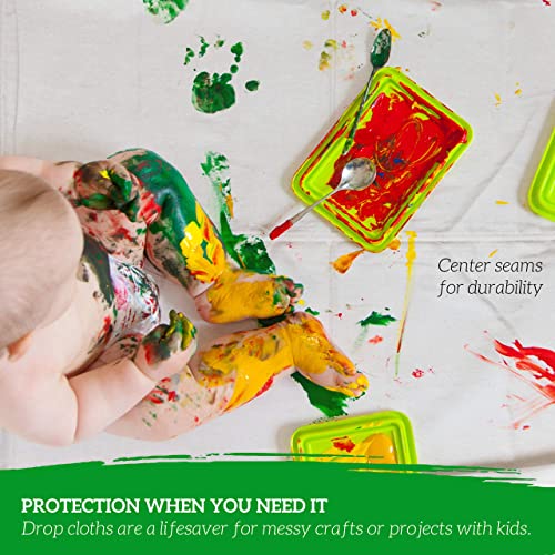 Worker using GREEN LIFESTYLE canvas tarp for painting