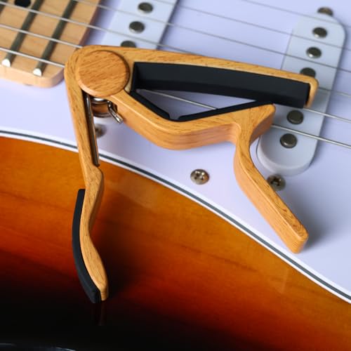 Top view of the burlywood finish capo mechanism