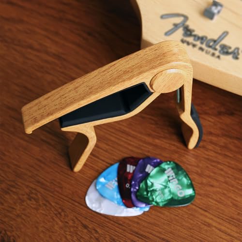 WINGO capo holding guitar strings securely