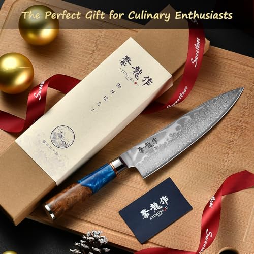 Atumuryou chef knife held in hand for scale