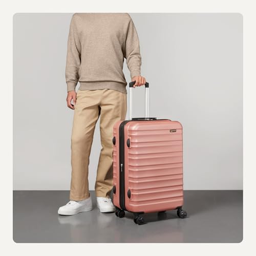 Basics 26-inch hardshell suitcase side view with handle