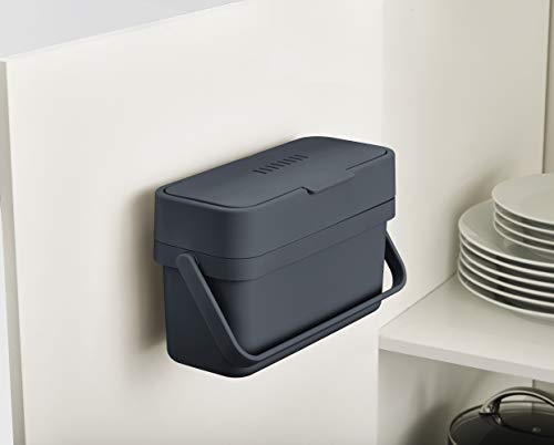 Side view showing the slim profile of the Joseph Joseph compost bin