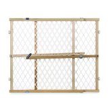 White wooden baby gate installed in doorway
