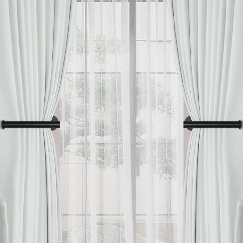 Groleca curtain tieback mounted on glass wall