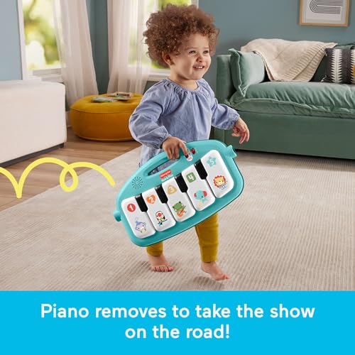 Baby playing on blue Kick & Play mat