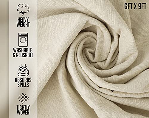 Folded cream canvas drop cloth texture