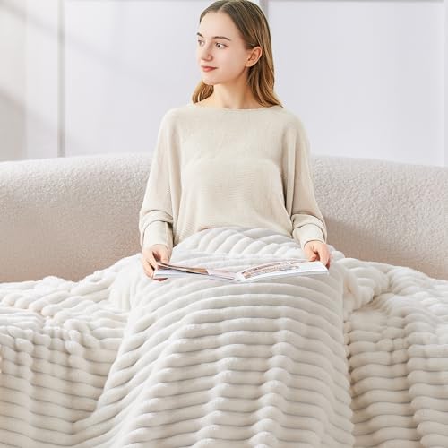 Lightweight fleece blanket folded on an accent chair