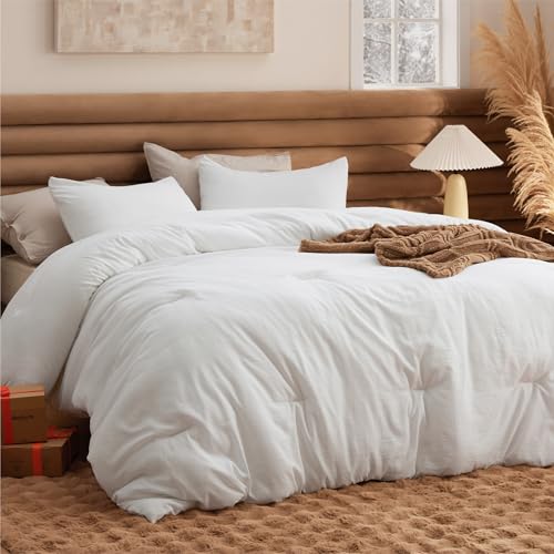 Bedsure Queen White Comforter folded on bed